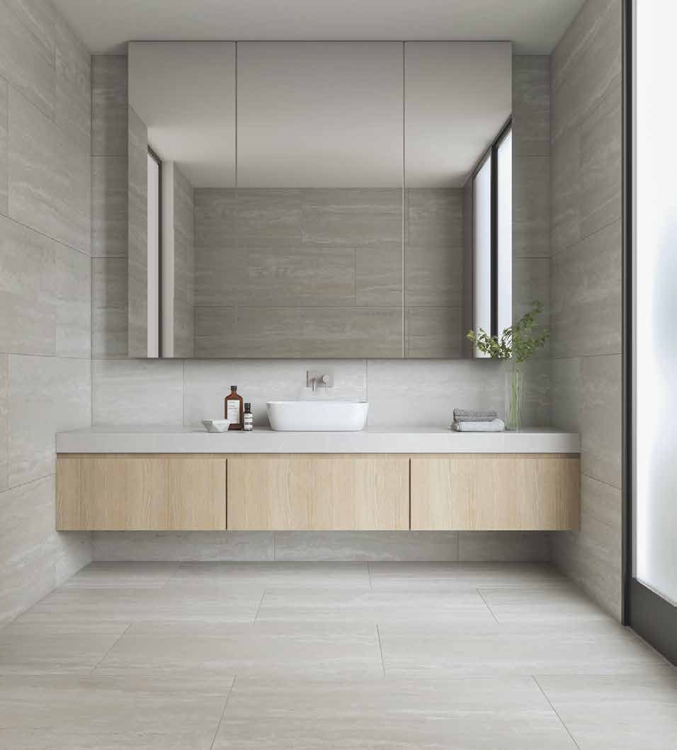Baño revestido en porcelanato Ilva Travertino Grey